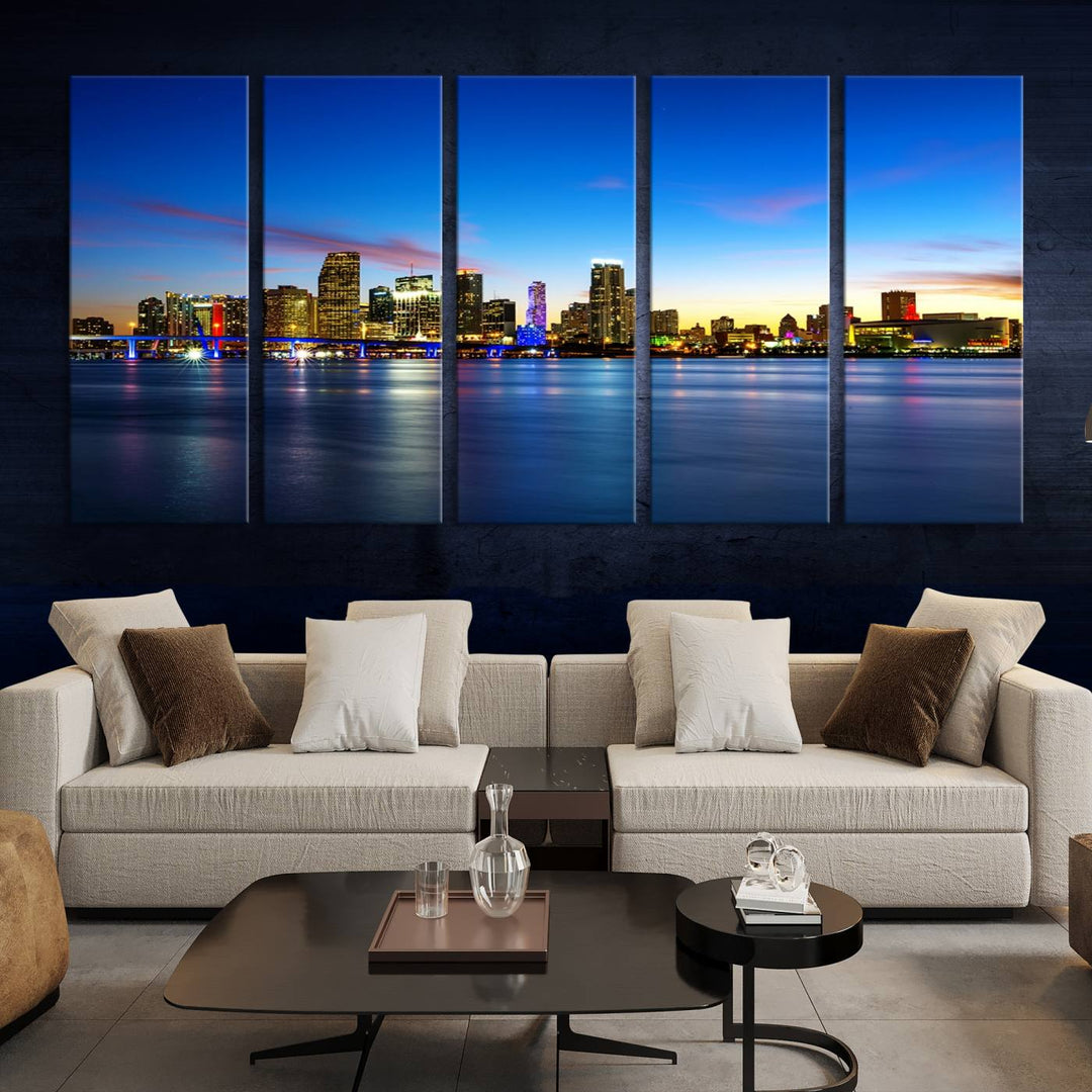 The living room features a Miami City Wall Art Canvas Print—a gallery-wrapped triptych displaying a city skyline at dusk, adding museum-quality elegance to the space.