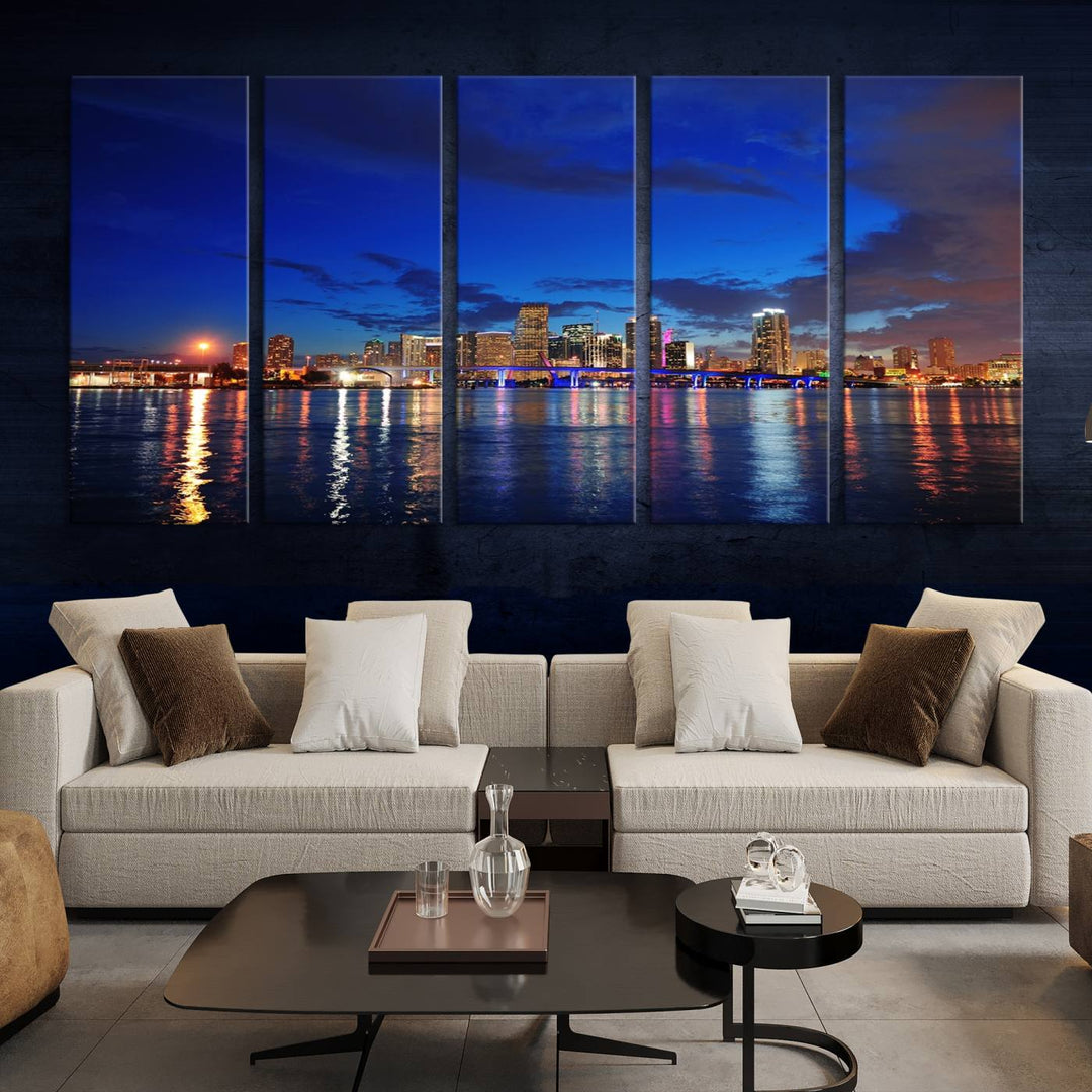 A large Miami City View Wall Art Canvas Print featuring the Miami City Skyline Panorama at night is displayed above the dresser.