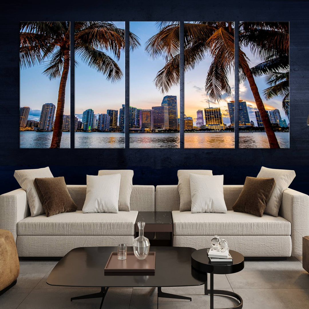 The Wall Art MIAMI Canvas Print features a triptych design depicting palm trees and a city skyline at sunset.