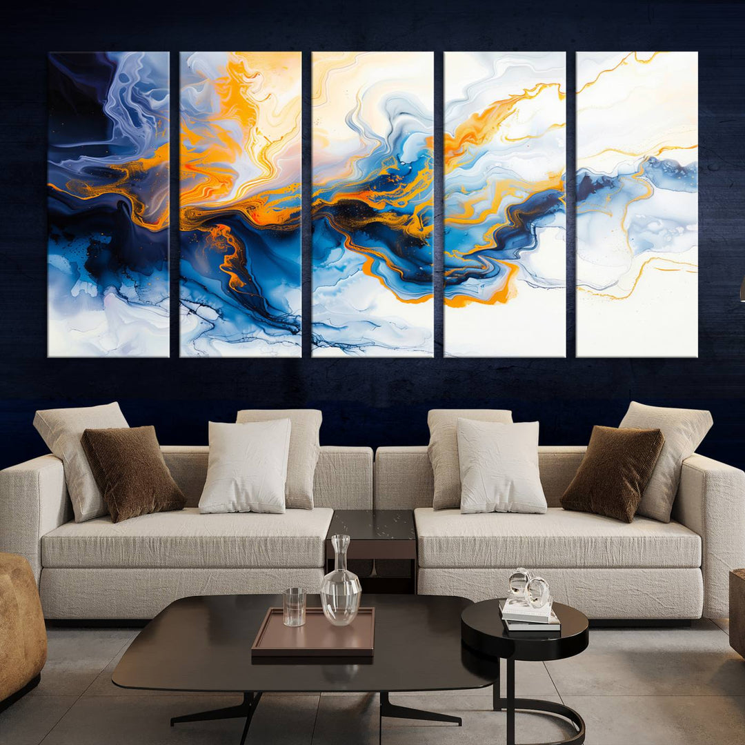 A stunning Fluid Alcohol Ink Wall Art with Gold Wall Art Canvas Print, featuring vibrant blue, orange, and white swirls, adorns the wall. This gallery-quality finish adds an exquisite touch to any living space.