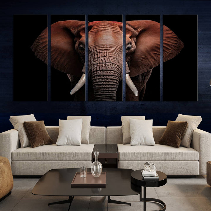 A stunning triptych titled "Wild Elephant Wall Art Canvas Print" beautifully enhances the wall above a contemporary living room. This Africa Savannah Wild Animal Wall Decor Print is of museum-quality, complete with a UV-protective coating to ensure its vibrancy and beauty are preserved for years.