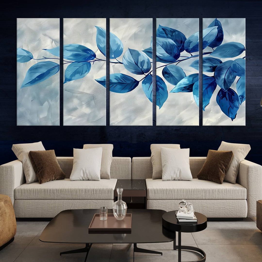 A Blue Leaf Abstract Wall Art Canvas Print, featuring a textured background and gallery-quality finish, is displayed.