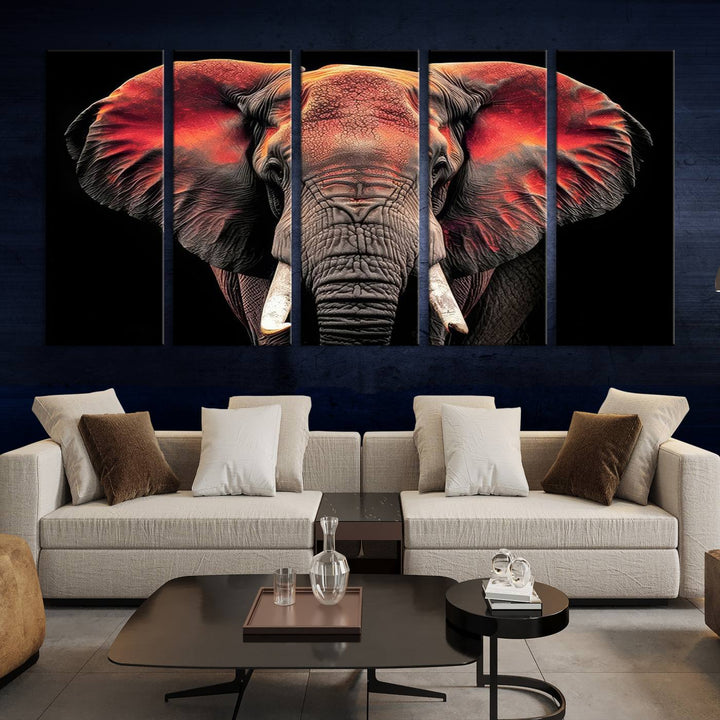 The Elephant Wall Art Canvas Print, featuring vibrant red and black tones, is a stunning artwork printed on museum-quality canvas. It comes with a UV-protective coating.