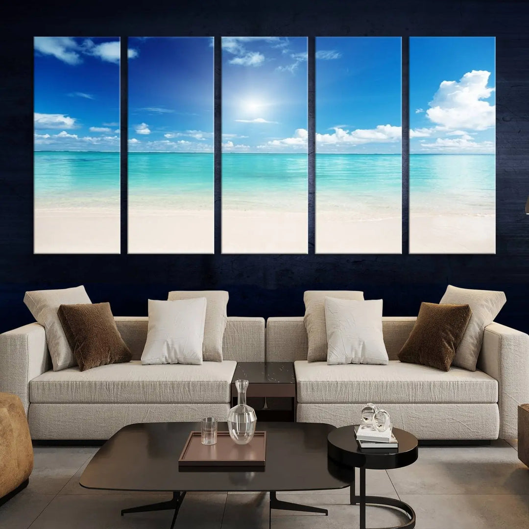 A contemporary living room showcasing the Wall Art Canvas Light Blue Beach and Ocean View.