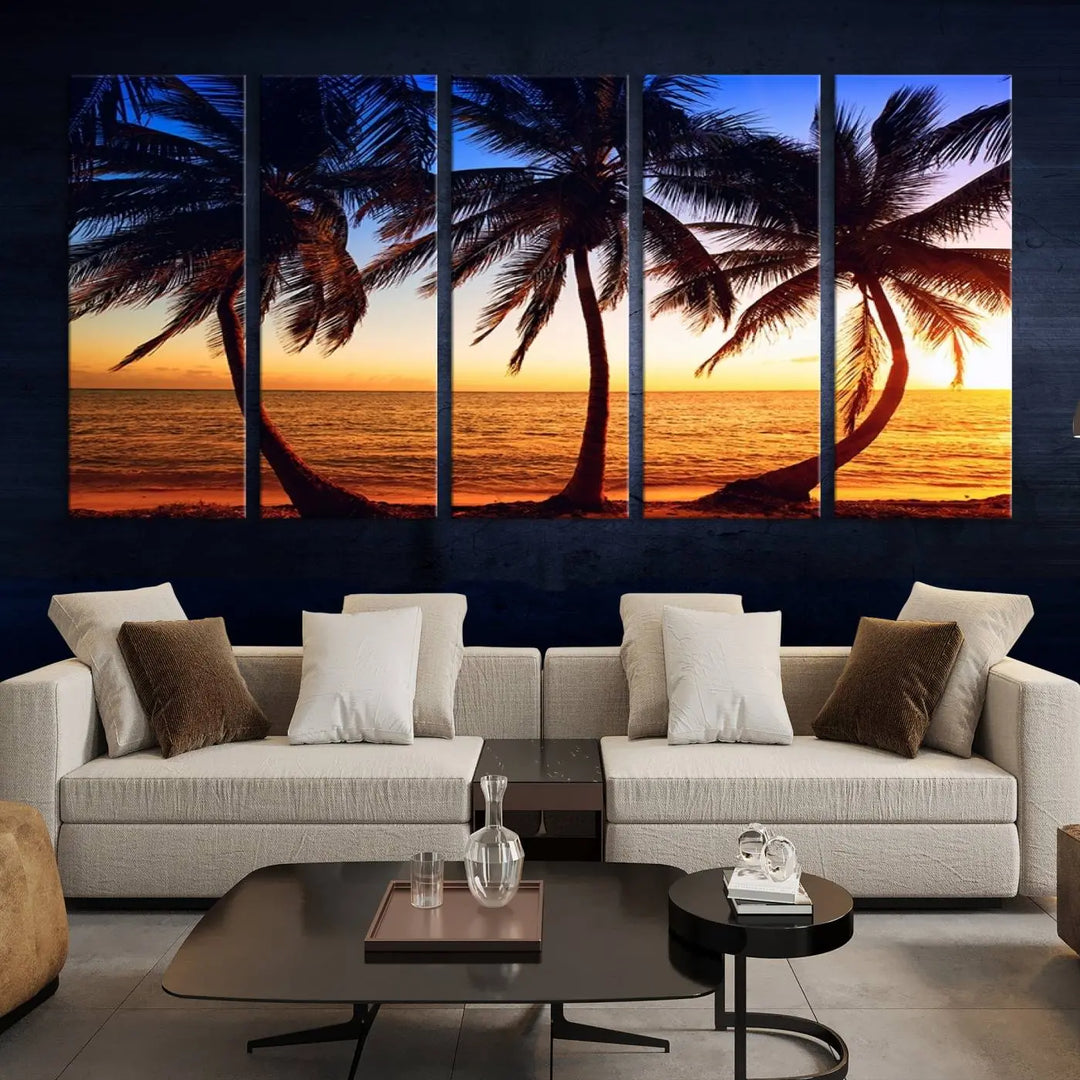 The living room features a wall adorned with the "Wall Art Canvas Curve Palms at Sunset on Beach," showcasing gallery-wrapped, museum-quality canvases in a stunning triptych.