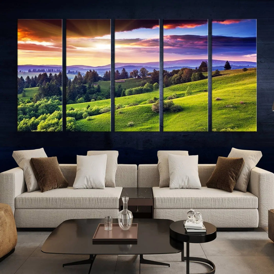 The room features a large triptych of the Green Hills and Sunset Wall Art Print, showcasing a scenic landscape with lush greenery and a vibrant sky.