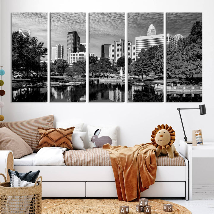 The living room features a captivating triptych titled "Charlotte City Cloudy Skyline Black and White Wall Art Cityscape Canvas Print," crafted on museum-quality canvas with UV-protective coating. Modern decor accentuates the dynamic scene.