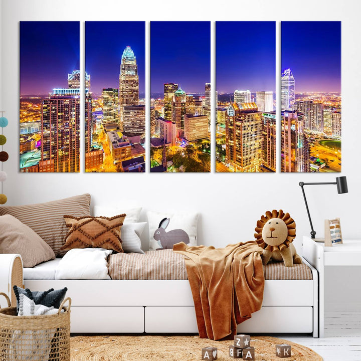 A modern living room features the Charlotte City Lights Night Blue Skyline Cityscape View wall art canvas print.