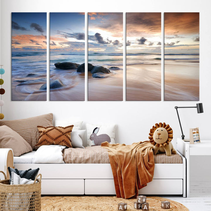 The "Serene Weather On The Beach Wall Art Canvas Print," featuring a tranquil beach scene with rocks and waves, is ready to hang and enjoy.