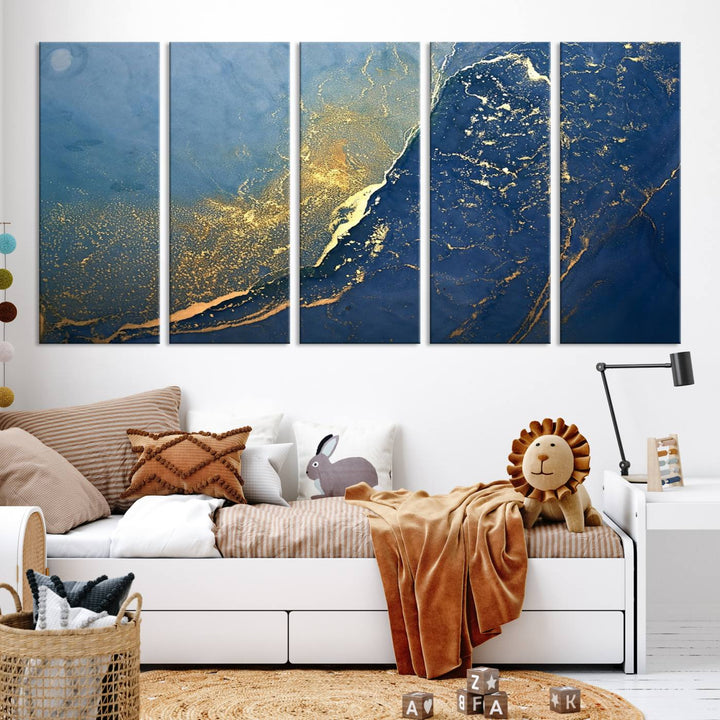 The Navy Blue Yellow Twinkle Wall Art Canvas Print, featuring an abstract design in gold and blue, enhances a modern living room as it adorns a white wall with its gallery-wrapped, museum-quality canvases for an exquisite touch.