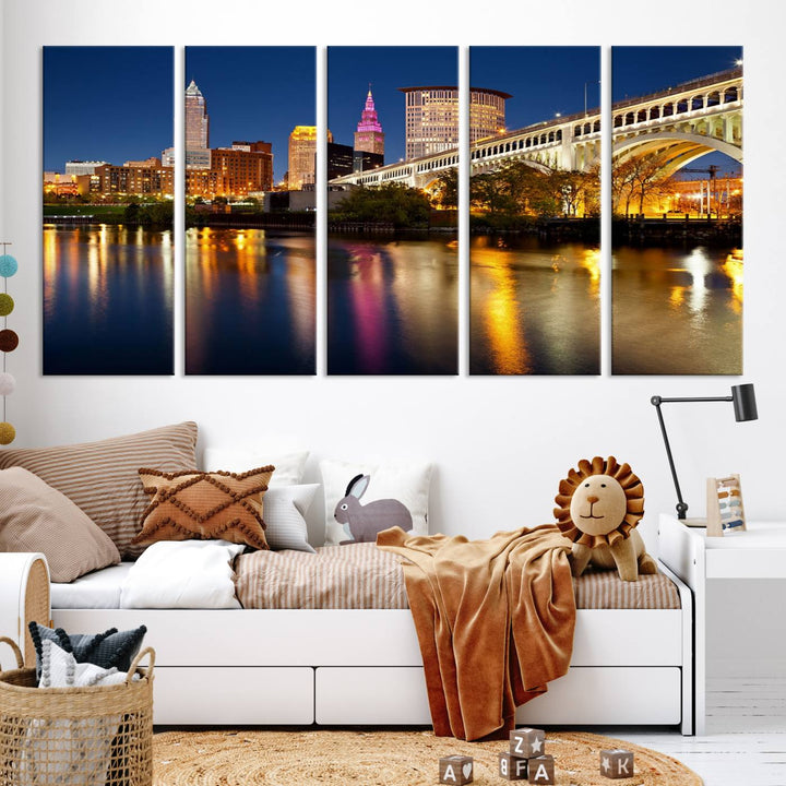 The "Cleveland Night Skyline Wall Art City Cityscape Canvas Print" is a striking feature in the room, showcasing a city skyline with a bridge reflecting in a river. Displayed on museum-quality canvas, it offers enduring beauty.