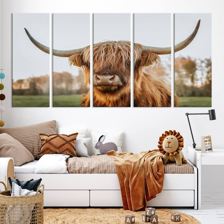 A Highland Cow Animal Scottish Cattle Art Print Farmhouse Wall Art Canvas Print hangs in the living room, adding a touch of rustic farmhouse decor.