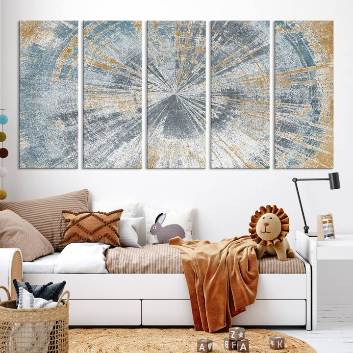 The Radiant Abstract Wood Rings Canvas Art, a modern triptych wall decor, enhances the contemporary style of the living room with its blue, white, and gold hues.