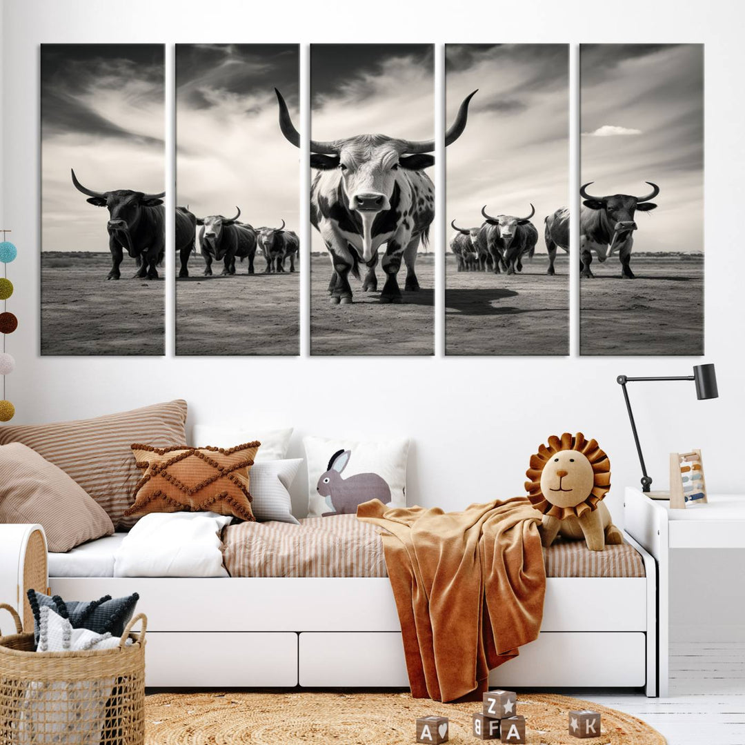 The Black and White Longhorn Cattle Wall Art, featuring a three-panel display of cowboy Western longhorns walking toward the viewer, enhances your space with its striking presence, adding a touch of Western decor.