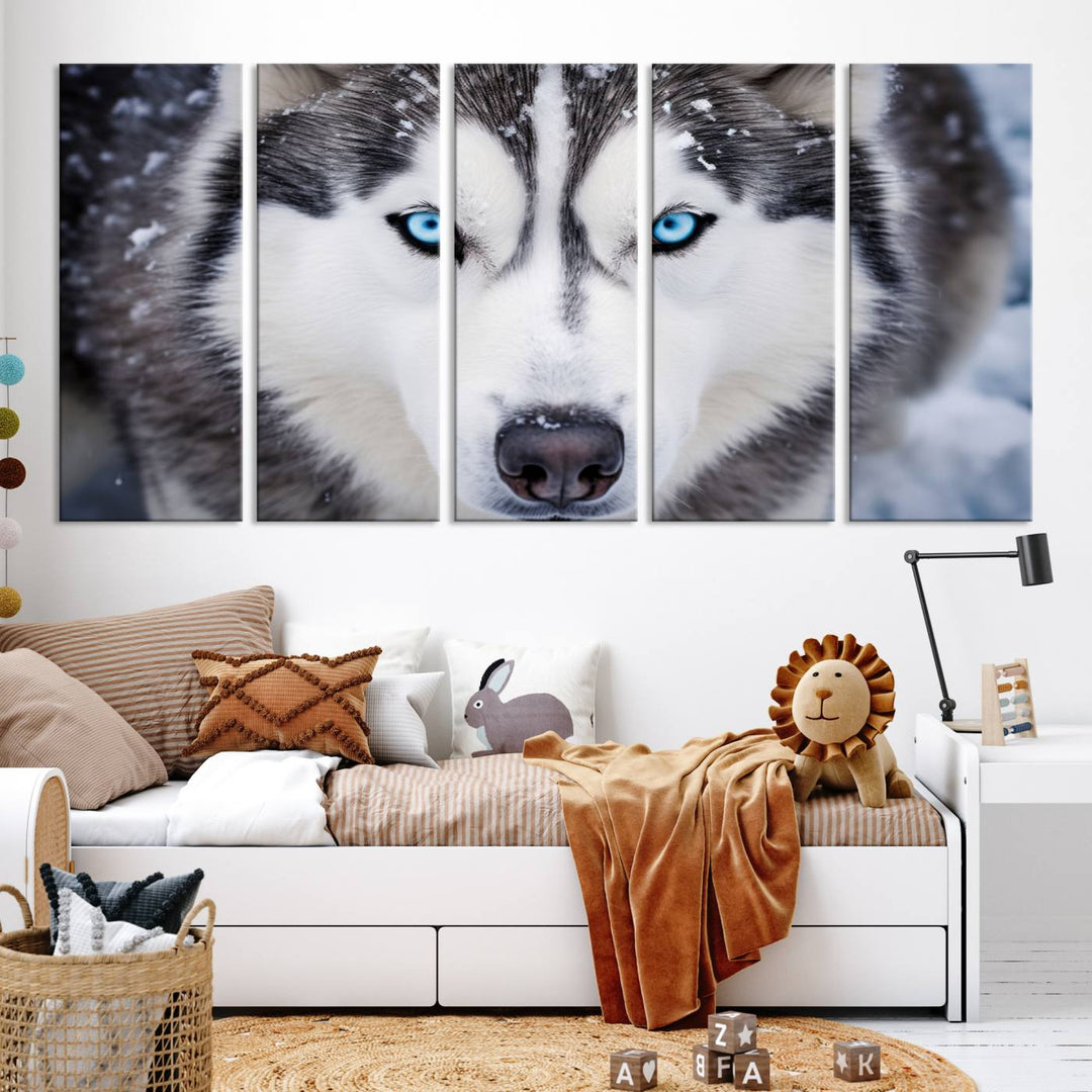 A large framed Winter Siberian Husky Wolf Wall Art Canvas Print, an exquisite piece of animal portrait decor, hangs prominently on the wall.