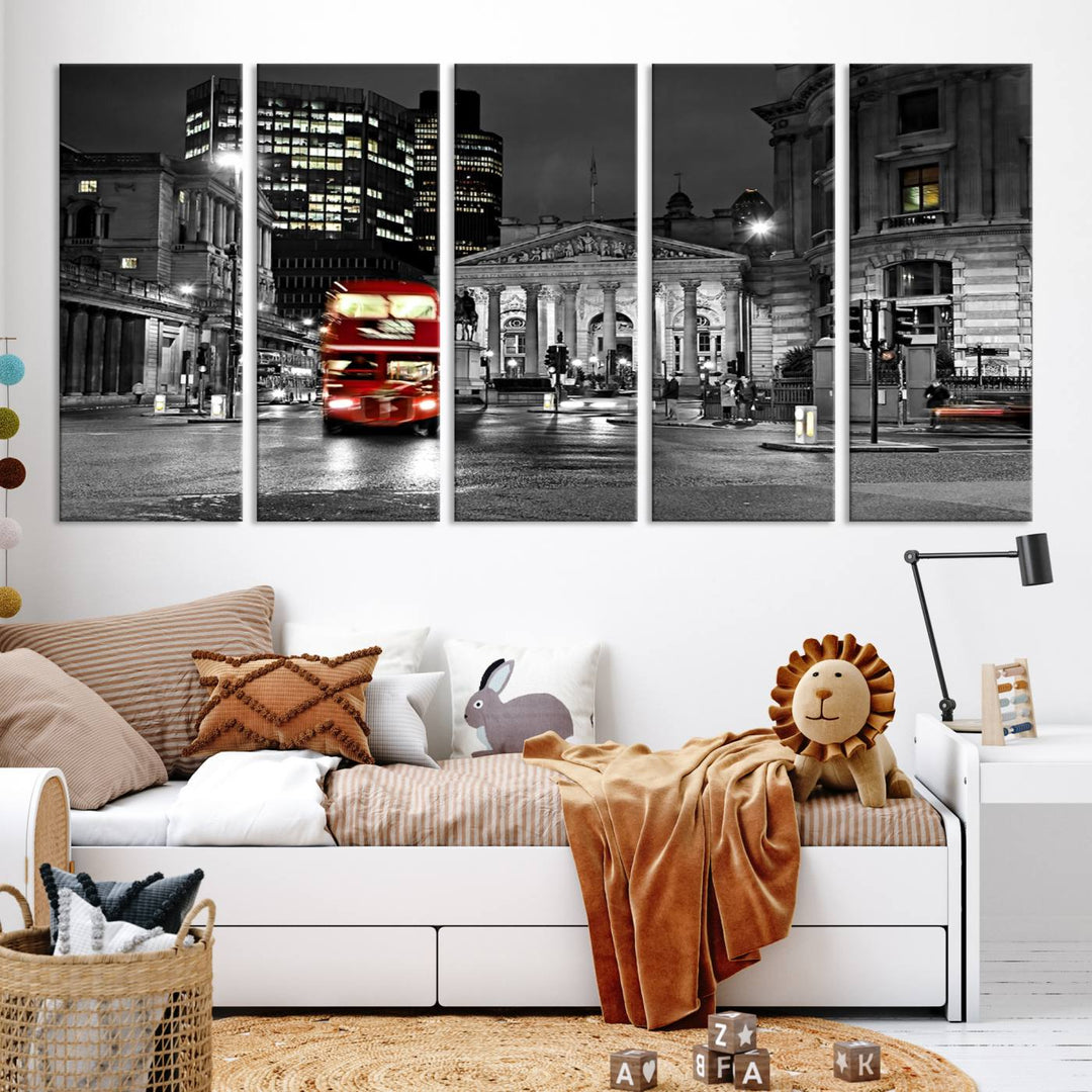 The London Night Red Bus Wall Art Canvas Print features a black and white cityscape with a moving red double-decker bus, crafted on museum-quality canvas with a UV-protective coating. This ready-to-hang artwork is designed to stand out and enhance any space.