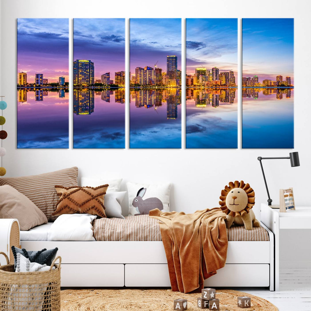 The Miami City Wall Art Canvas Print, featuring a three-panel depiction of a city skyline at sunset reflected in water, beautifully enhances the wall. Made with museum-quality canvas and a UV-protective coating, it comes ready to hang.