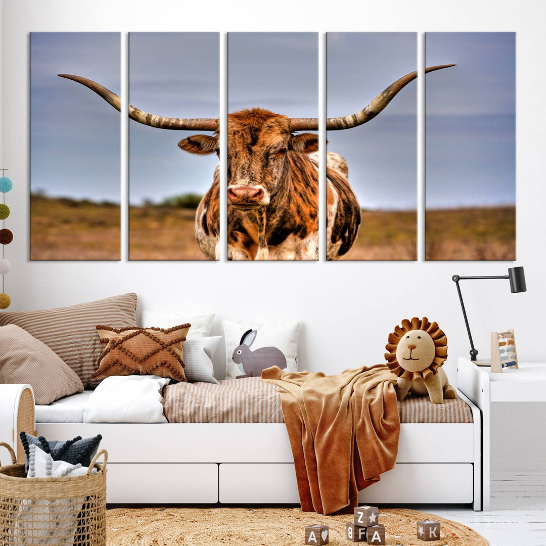 The Texas Longhorn Wall Art Print, a triptych canvas artwork depicting a longhorn bull in a field, features a gallery-quality finish.