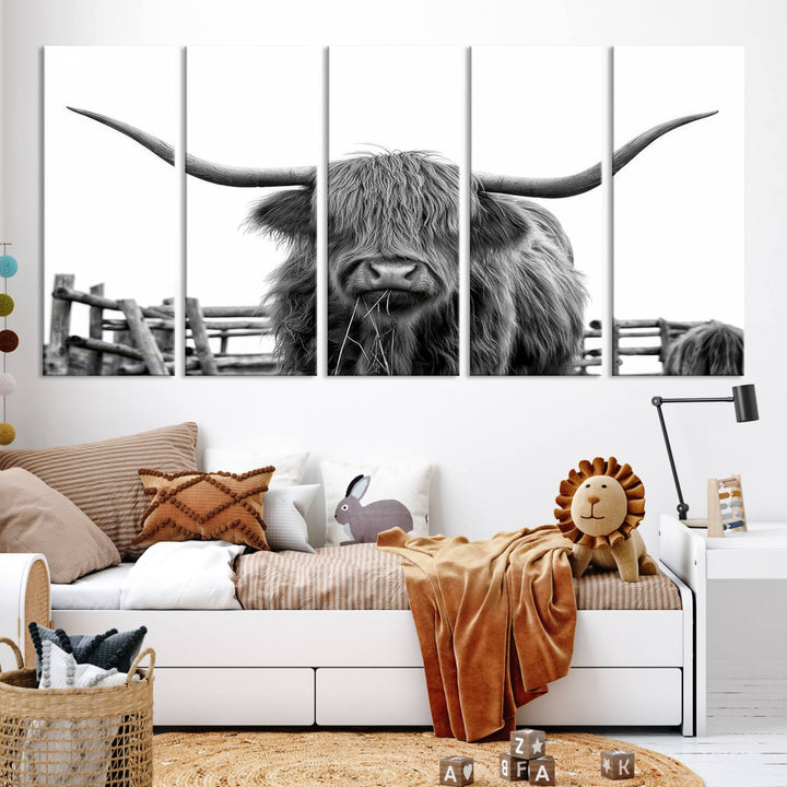 The Longhorn Canvas Print, featuring a black-and-white triptych of a Bighorn cow with shaggy fur and impressive long horns, is elegantly showcased. This wall art piece boasts a gallery-quality finish on premium canvas, bringing sophistication to any room.