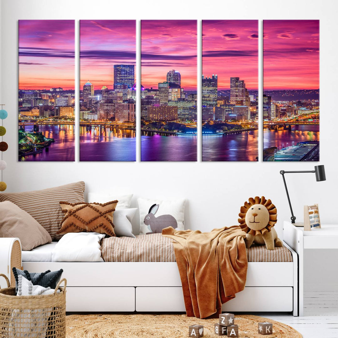 The Pittsburg Wall Art Canvas Print, showcasing a vibrant sunset glow over the city skyline and crafted by a professional artisan, adorns the space.