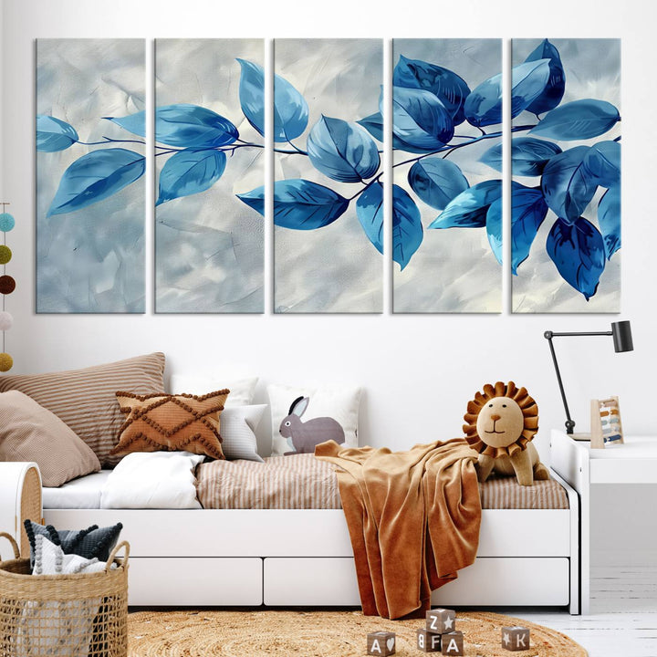 A Blue Leaf Abstract Wall Art Canvas Print, featuring a textured background and gallery-quality finish, is displayed.