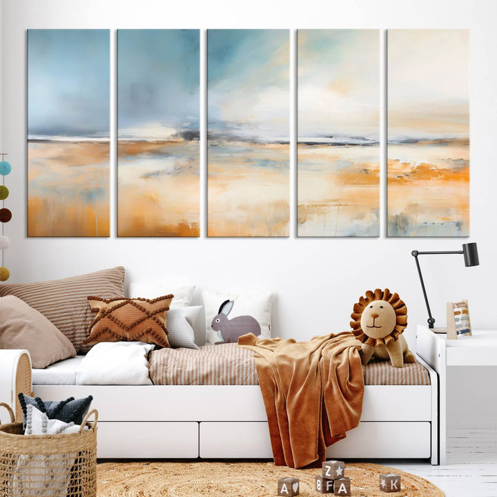 The Abstract Landscape Wall Art Canvas Print, featuring warm tones of orange and blue, is displayed on a dark wall.