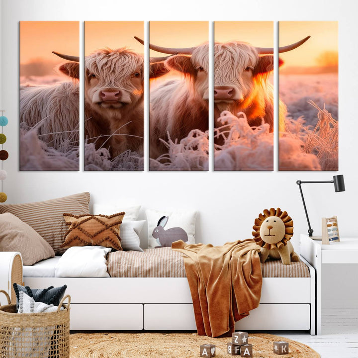 The "Highland Cows at Sunrise Wall Art Canvas Set" beautifully captures a serene and rustic farmhouse aesthetic, portraying two Highland cows in a frosty landscape at sunrise.