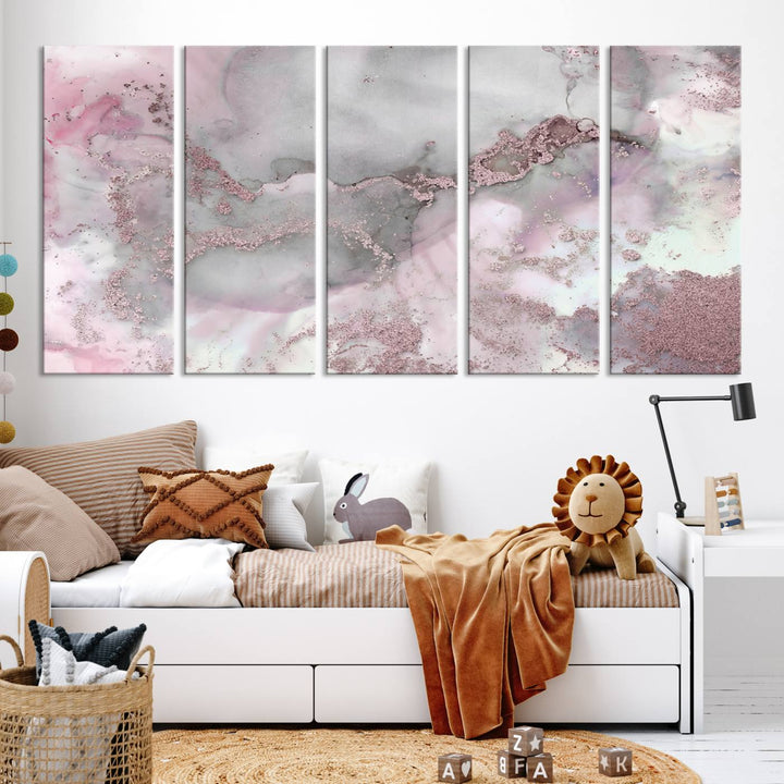 The Rose Marble Abstract Wall Art Canvas Print is a stunning triptych that showcases pink and gray tones, elegantly presented on a dark wall.