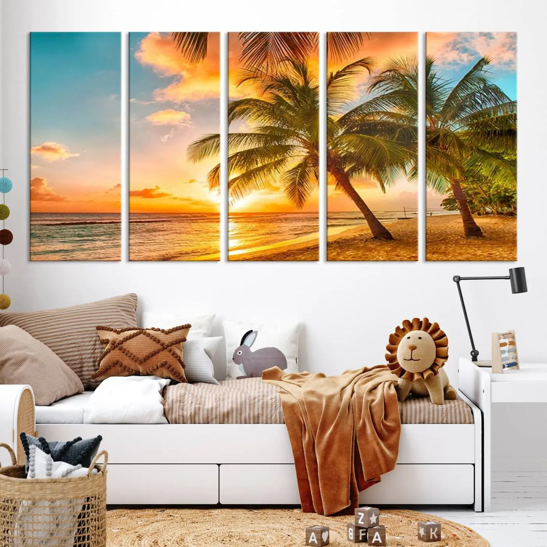 The Tropical Sunset Wall Art Print features a vibrant beach scene with palm trees and an ocean view highlighted by a golden sunset.