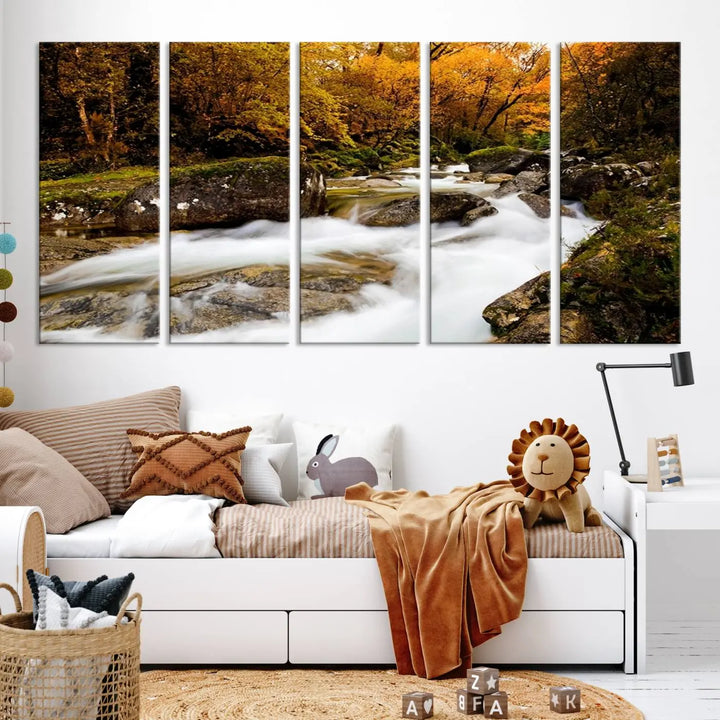 The living room is adorned with the "Wall Art Waterfall Canvas Print River in Forest in Autumn," a triptych on museum-quality canvas showcasing a flowing river surrounded by autumn trees. This ready-to-hang artwork features a UV-protective coating to ensure enduring vibrancy.