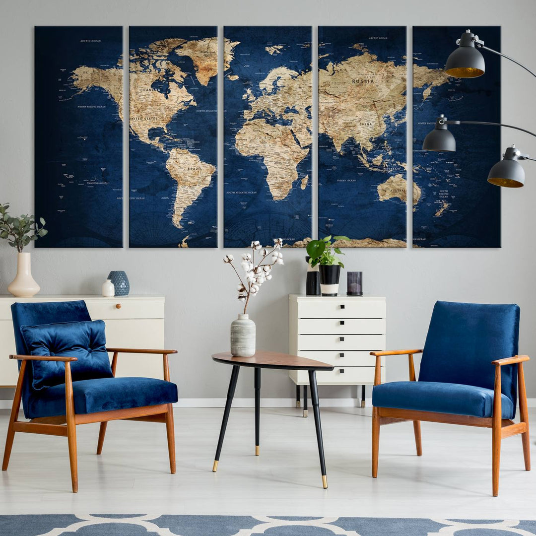 A triptych canvas print titled "Vintage Blue World Map Canvas Print - Classic World Map Design on Deep Blue Wall Art Print" adorns the wall, enhancing the decor with its antique style.