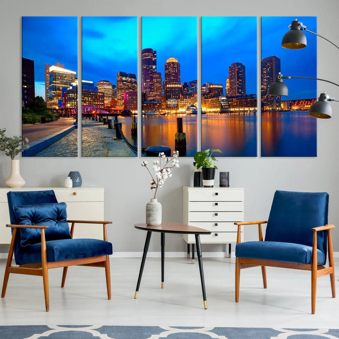 A triptych of the "Boston City Lights Night Blue Skyline Cityscape View Wall Art Canvas Print" adorns the wall. This museum-quality canvas artwork is ready to hang and includes a UV-protective coating for lasting brilliance.