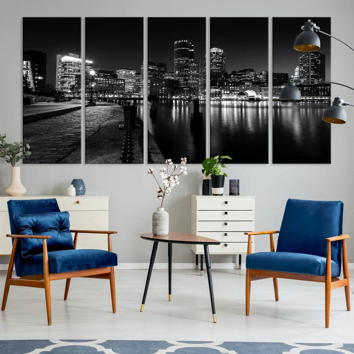 The Boston City Lights Skyline Black and White Wall Art Cityscape Canvas Print portrays a triptych of the city skyline at night reflecting on a calm river. This museum-quality canvas features UV-protective finishes to preserve its timeless allure.