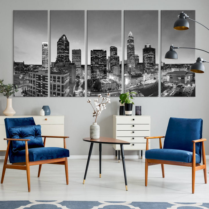 The "Charlotte City Cloudy Skyline Black and White Wall Art Cityscape Canvas Print" hangs on a dark wall, showcasing its UV-protective properties for enduring beauty.