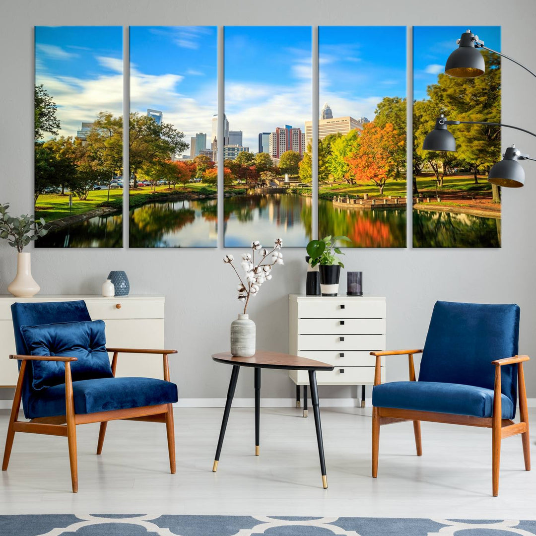 The Charlotte City Park at Spring Skyline Cityscape View wall art canvas print is a triptych featuring a scenic park with a lake and city skyline. It is gallery-wrapped on museum-quality canvases.