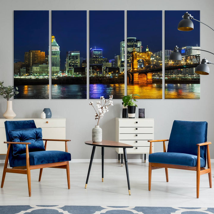 The "Cincinnati City Lights Night Skyline Cityscape" canvas print, displayed above a sofa, exhibits museum-quality craftsmanship with a UV-protective coating.