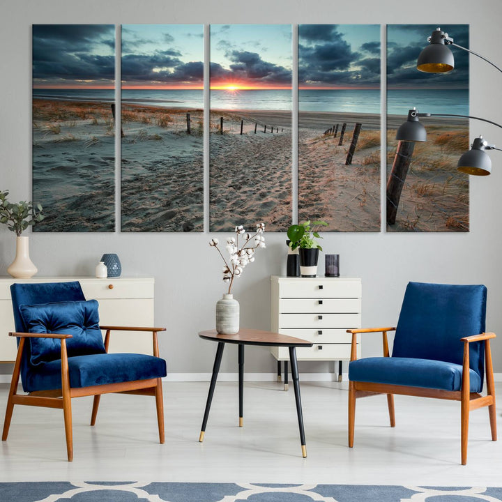 The modern living room features the Cloudy Weather Sunset Beach Wall Art Canvas Print. This museum-quality canvas adds a touch of sophistication with its hand-assembled framed art, ensuring lasting elegance. Enjoy free shipping on this exquisite piece.