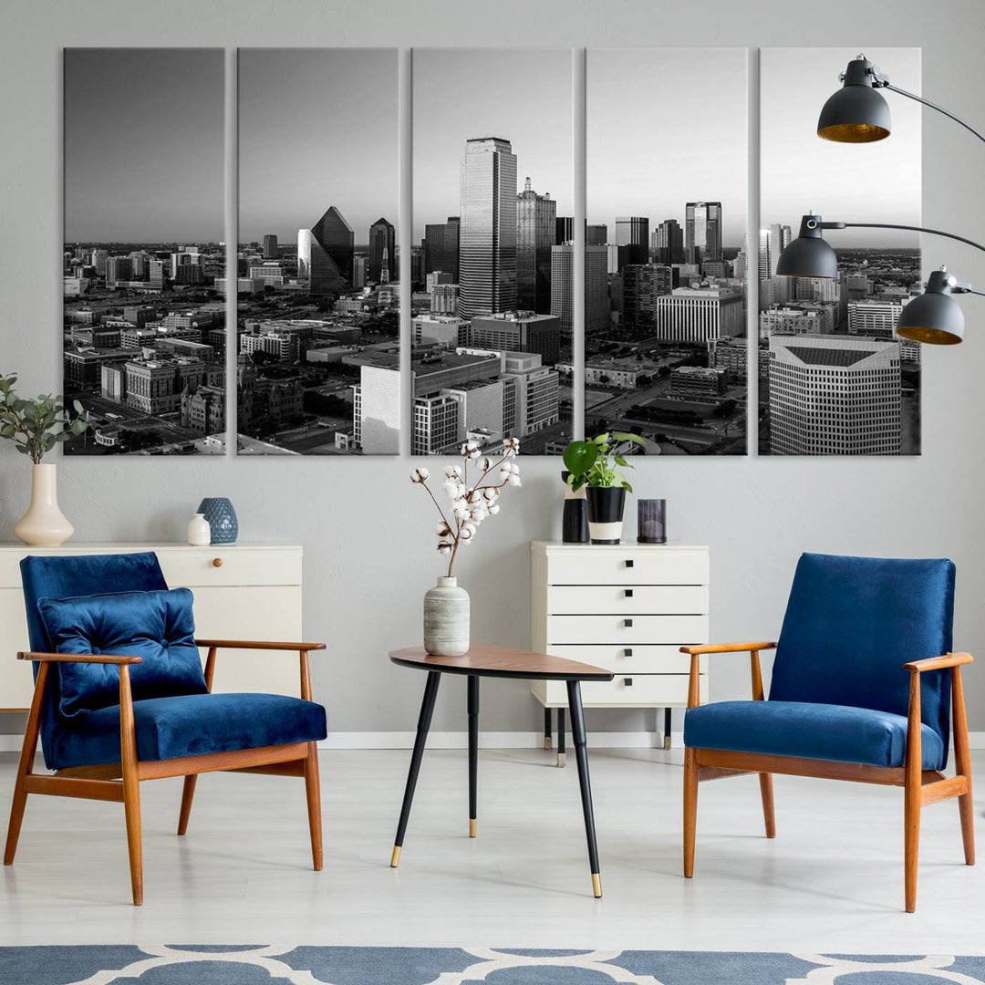 A modern living room showcases the Dallas City Lights Skyline Black and White Wall Art Cityscape Canvas Print. This gallery-wrapped piece offers a sleek finish and is crafted from museum-quality pollycotton. It features a UV-protective coating to ensure lasting vibrancy.