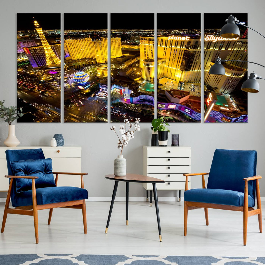 The modern living room features a Las Vegas Wall Art Canvas Print, a museum-quality triptych showcasing a vibrant cityscape with neon lights.