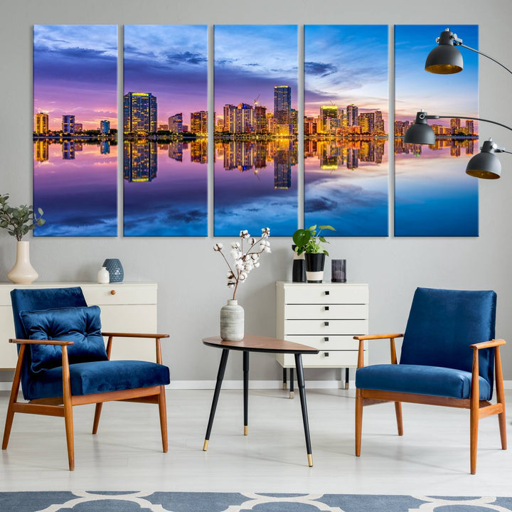 The Miami City Wall Art Canvas Print, featuring a three-panel depiction of a city skyline at sunset reflected in water, beautifully enhances the wall. Made with museum-quality canvas and a UV-protective coating, it comes ready to hang.