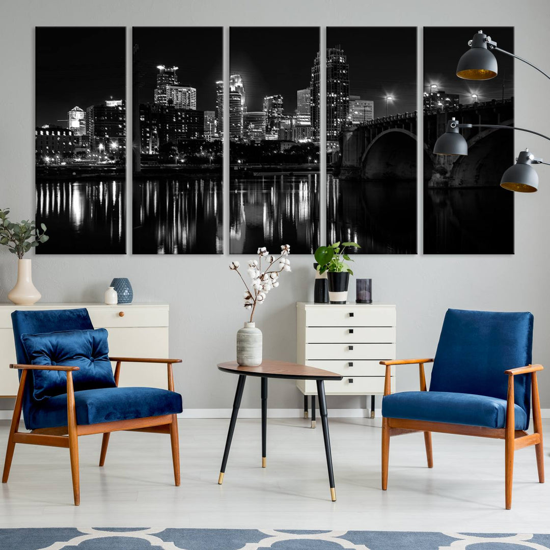 The "Minneapolis Wall Art Canvas Print, Minnesota City Wall Art Print, Minnesota Cityscapes Wall Art" features a black and white triptych of a city skyline with a bridge. Crafted on museum-quality canvas, this gallery-wrapped artwork is finished with a UV-protective coating to ensure lasting beauty.