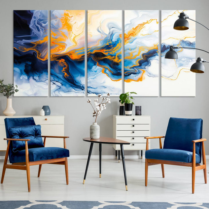 A stunning Fluid Alcohol Ink Wall Art with Gold Wall Art Canvas Print, featuring vibrant blue, orange, and white swirls, adorns the wall. This gallery-quality finish adds an exquisite touch to any living space.