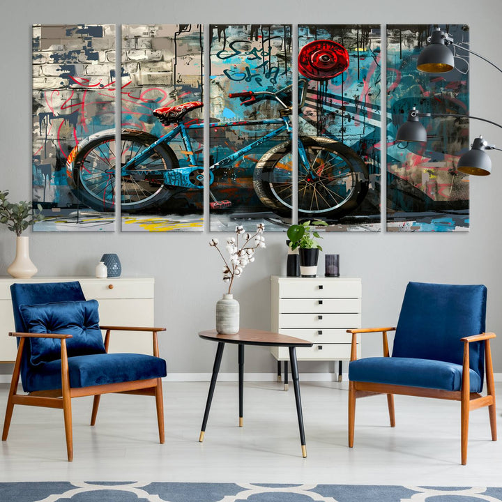 A modern living room features a triptych wall art of an abstract bicycle, designed in a graffiti style on a brick wall. This piece is expertly crafted on the Abstract Bicycle Wall Art Canvas Print, offering a premium canvas that ensures a gallery-quality finish.