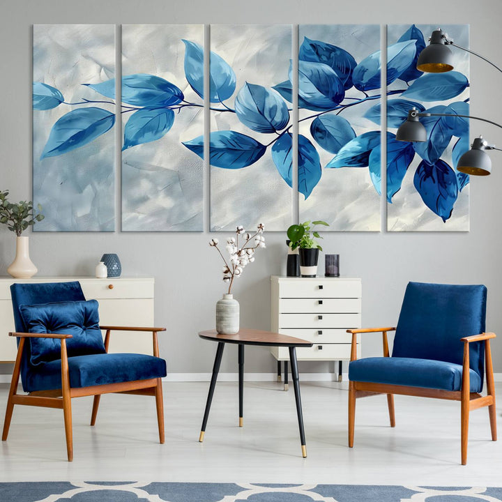 A Blue Leaf Abstract Wall Art Canvas Print, featuring a textured background and gallery-quality finish, is displayed.