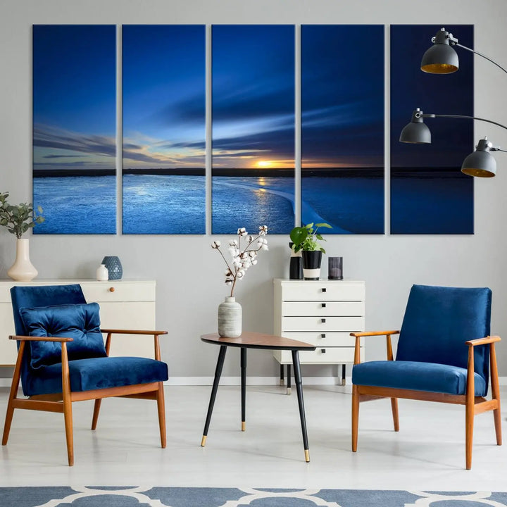 The living room features a triptych of the Wall Art Canvas Print Navy Sunset Lake Landscape Artwork, adding to its tranquil vibe.