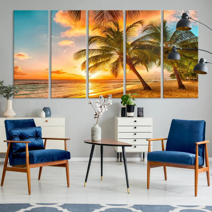 The Tropical Sunset Wall Art Print features a vibrant beach scene with palm trees and an ocean view highlighted by a golden sunset.