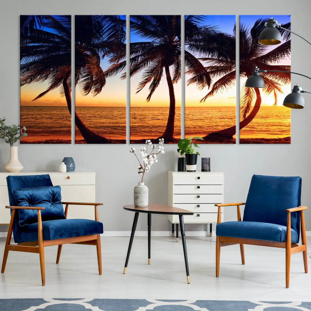 The living room features a wall adorned with the "Wall Art Canvas Curve Palms at Sunset on Beach," showcasing gallery-wrapped, museum-quality canvases in a stunning triptych.