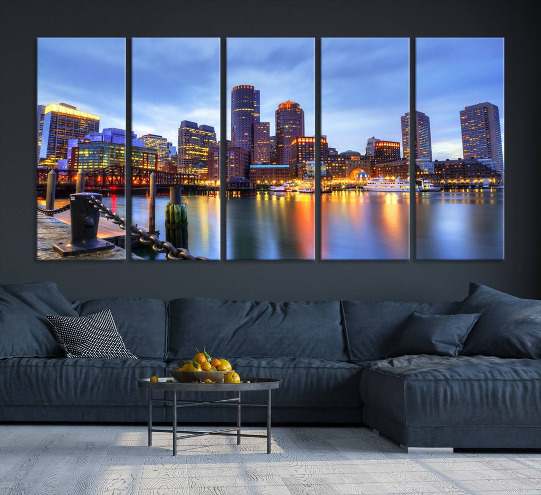 The Boston City Lights Sunset Cloudy Blue Skyline Cityscape View Wall Art Canvas Print embellishes a contemporary living room. This gallery-wrapped canvas set guarantees museum-quality canvases to enhance any space.