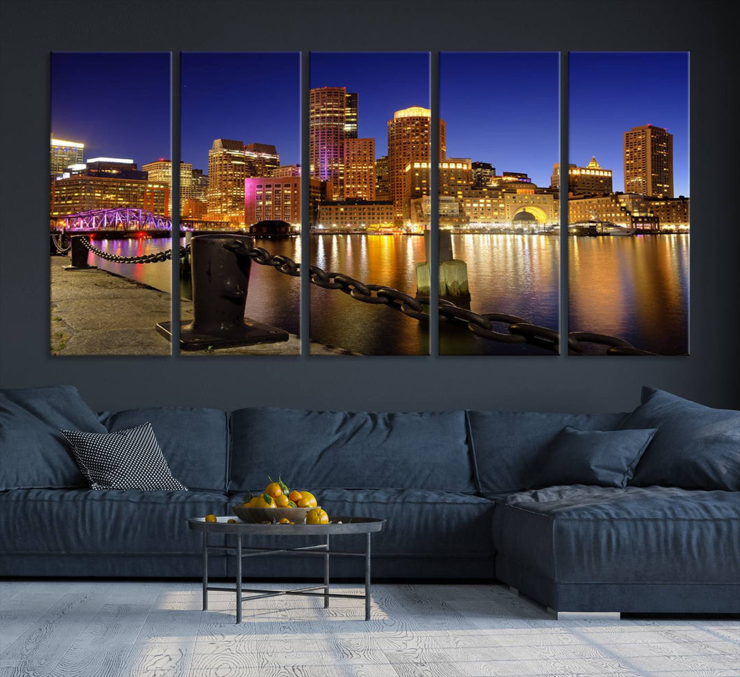 The "Boston City Night Skyline Cityscape View Wall Art Canvas Print" beautifully portrays a stunning triptych of a city skyline illuminated against the night sky, elegantly reflected in the river below. These museum-quality canvases are gallery wrapped to ensure an elegant presentation that enhances any space.