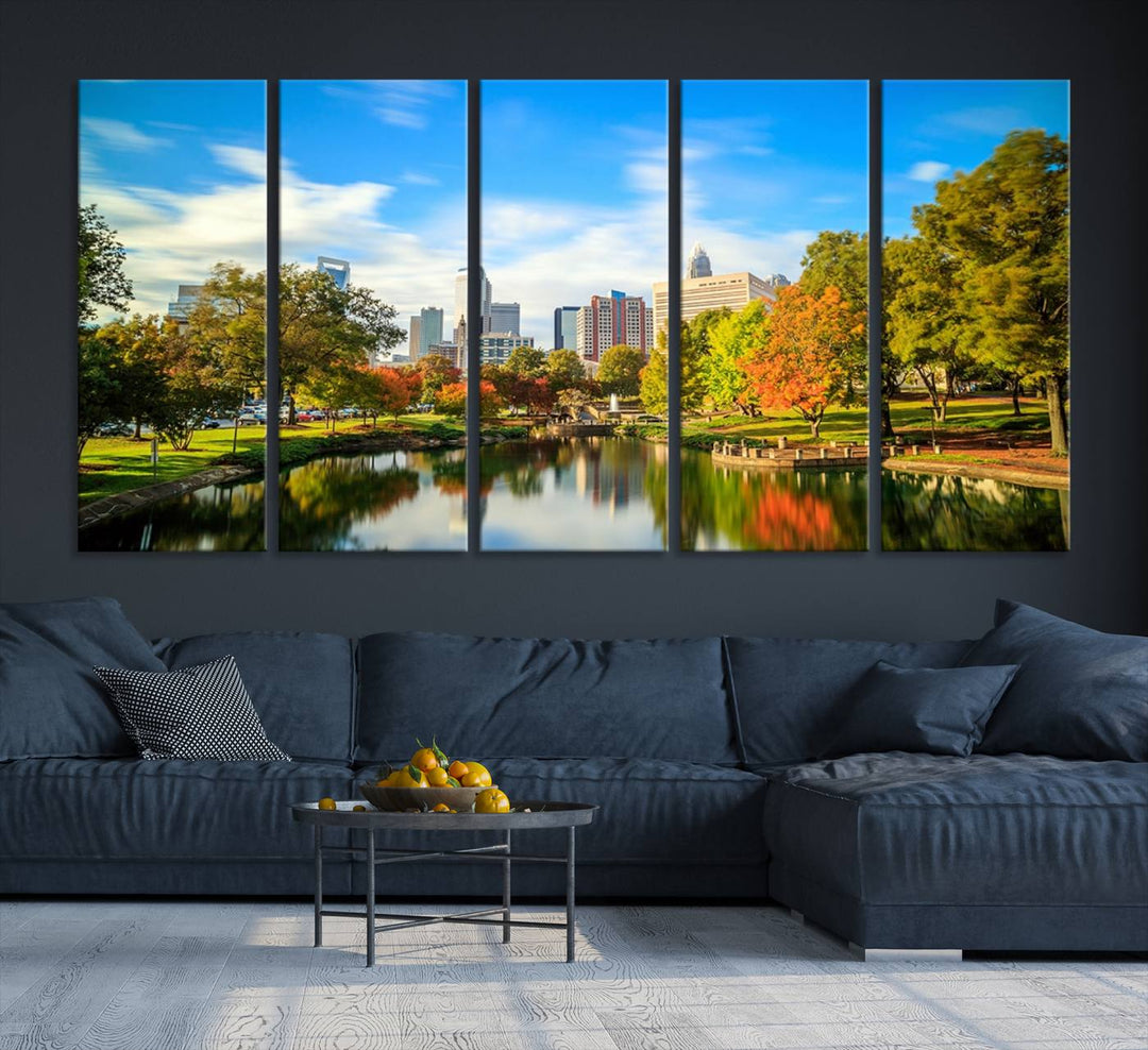 The Charlotte City Park at Spring Skyline Cityscape View wall art canvas print is a triptych featuring a scenic park with a lake and city skyline. It is gallery-wrapped on museum-quality canvases.